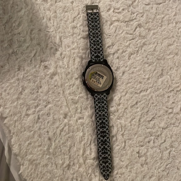 Brand new black on black silicon coach watch. With price still attached. - Picture 2 of 4